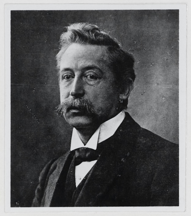 A studio photograph of Christiaan Eijkman as a young man in a dark suit and bow tie, bearded, looking to the left