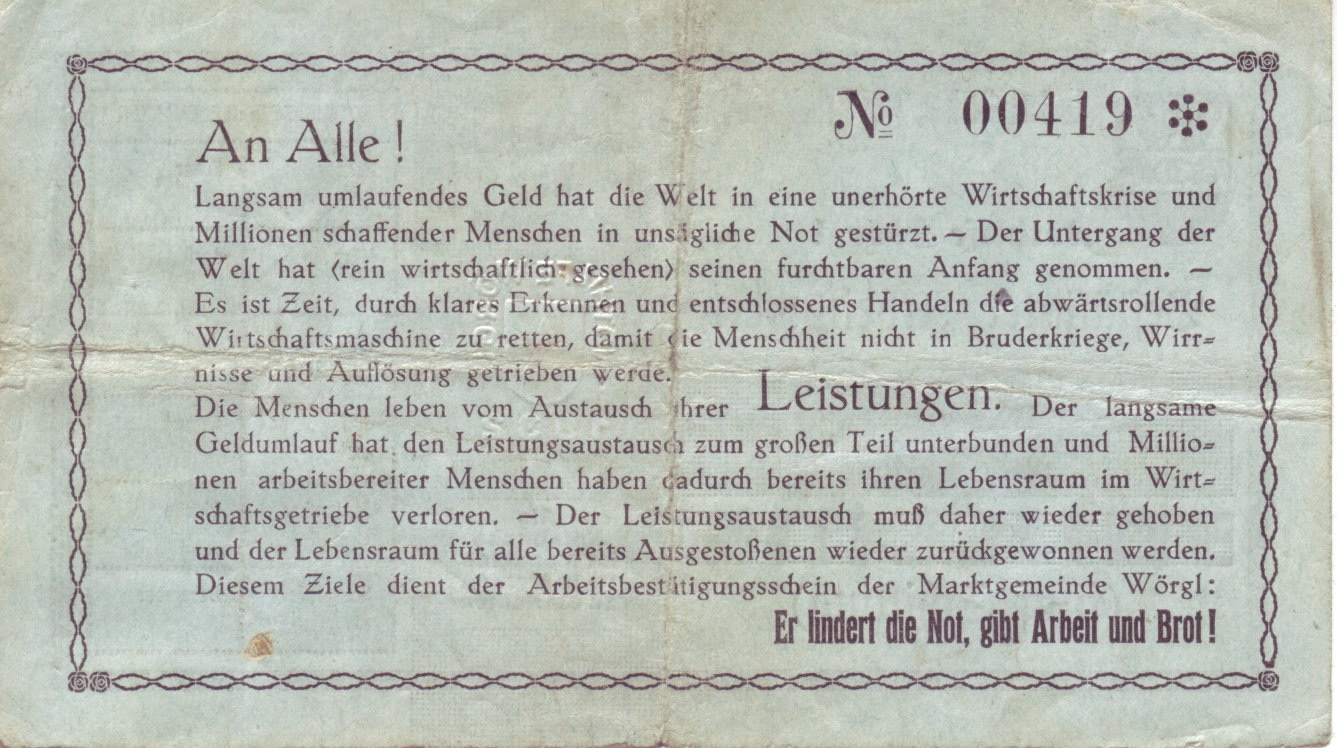 The back of a grey-green five-schilling Wörgl certificate, numbered 00419, printed with the address An Alle and ending Er lindert die Not, gibt Arbeit und Brot